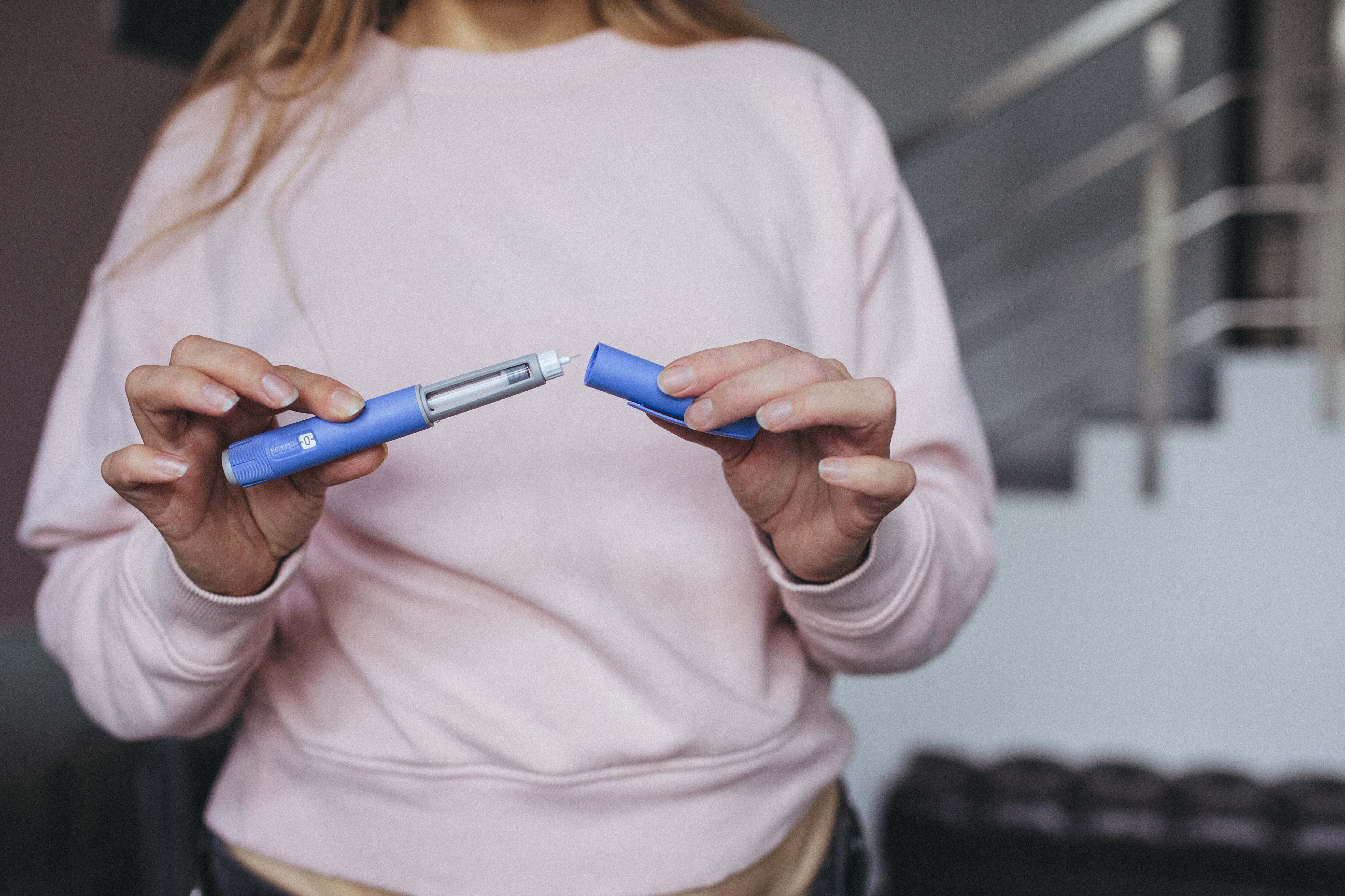 Semaglutide pen preparation for injection therapy captured in detail.