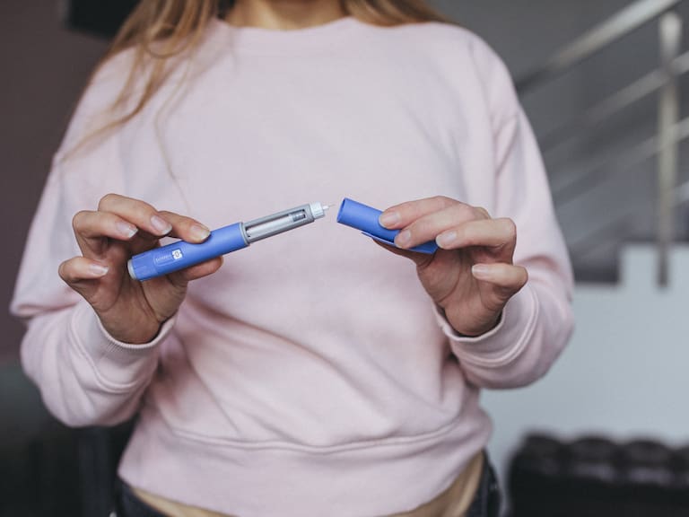 Semaglutide pen preparation for injection therapy captured in detail.