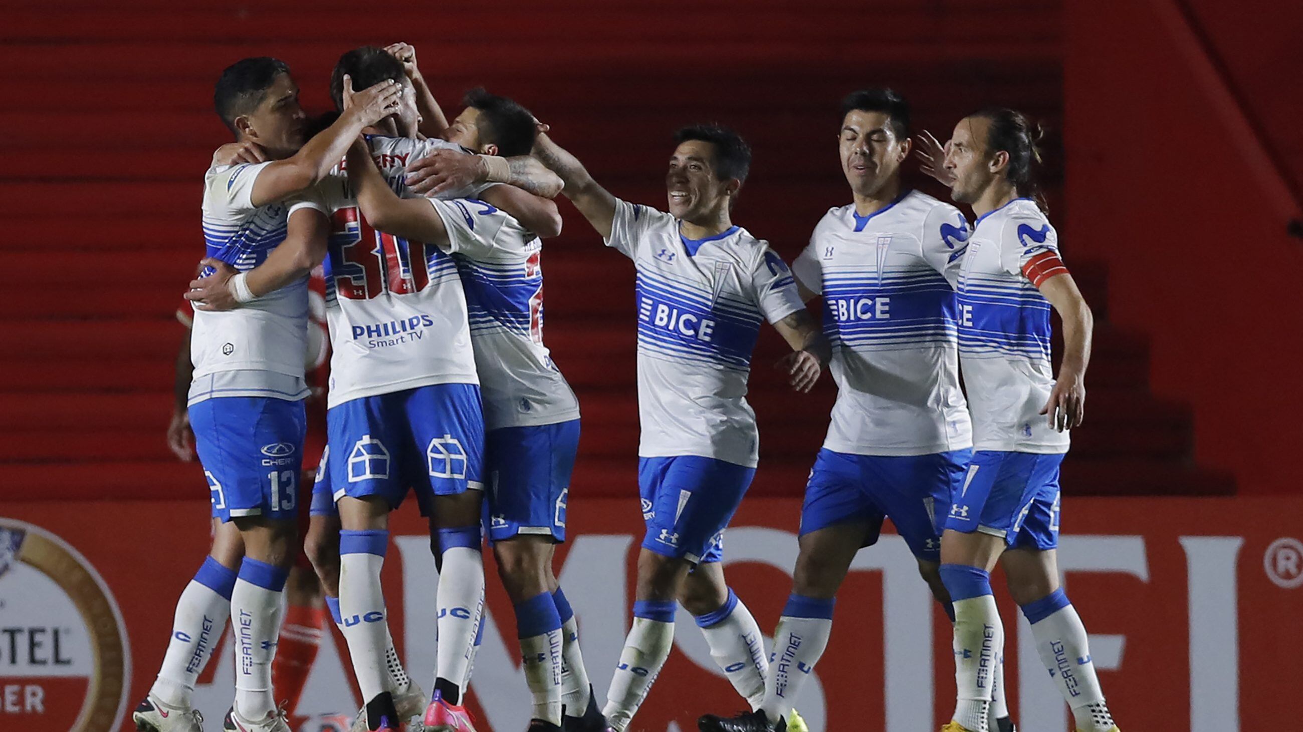 Chile's Universidad Catolica players celebrate after scoring against Argentina's Argentinos Juniors during their Copa Libertadores football tournament group stage at the Diego Armando Maradona stadium in Buenos Aires on May 12, 2021. (Photo by Juan Ignacio RONCORONI / various sources / AFP) (Photo by JUAN IGNACIO RONCORONI/AFP via Getty Images)