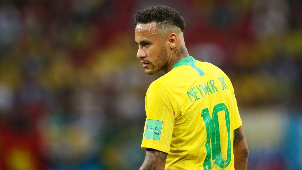 KAZAN, RUSSIA - JULY 06:    Neymar of Brazil looks dejected during the 2018 FIFA World Cup Russia Quarter Final match between Brazil and Belgium at Kazan Arena on July 6, 2018 in Kazan, Russia. (Photo by Matthew Ashton - AMA/Getty Images)