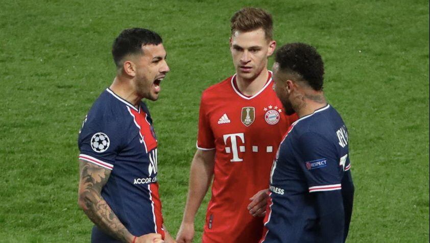 PARIS, FRANCE - APRIL 13: Leandro Paredes and Neymar Jr of Paris Saint-Germain celebrate the victory and Joshua Kimmich of FC Bayern Munich is dissapointed  after the UEFA Champions League Quarter Final Second Leg match between Paris Saint-Germain and FC Bayern Munich at Parc des Princes on April 13, 2021 in Paris, France. (Photo by Xavier Laine/Getty Images)