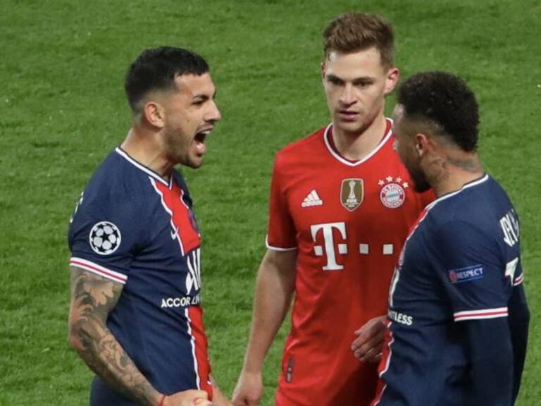 PARIS, FRANCE - APRIL 13: Leandro Paredes and Neymar Jr of Paris Saint-Germain celebrate the victory and Joshua Kimmich of FC Bayern Munich is dissapointed after the UEFA Champions League Quarter Final Second Leg match between Paris Saint-Germain and FC Bayern Munich at Parc des Princes on April 13, 2021 in Paris, France. (Photo by Xavier Laine/Getty Images)