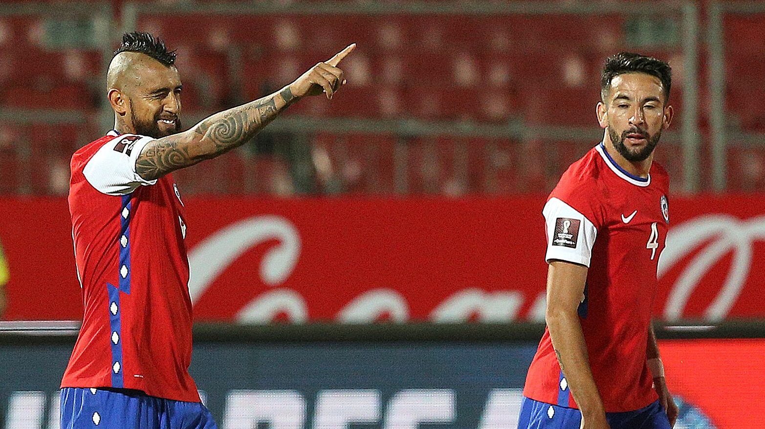 SANTIAGO, CHILE - OCTOBER 13: Arturo Vidal of Chile celebrates after scoring the first goal of his team during a match between Chile and Colombia as part of South American Qualifiers for Qatar 2022 at Estadio Nacional de Chile on October 13, 2020 in Santiago, Chile. (Photo by Claudio Reyes - Pool/Getty Images)
