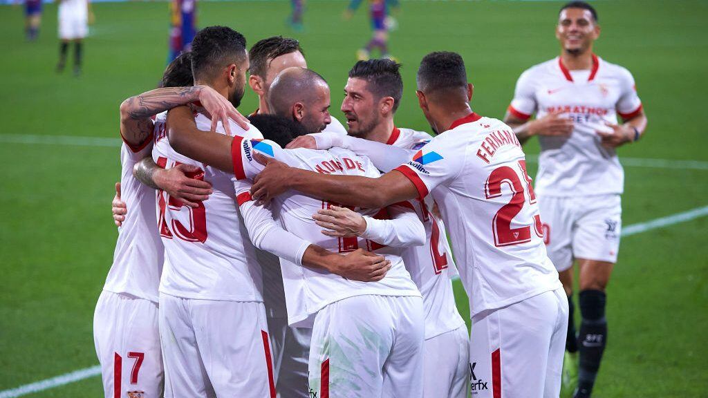 SEVILLE, SPAIN - FEBRUARY 10: Jules Kounde of Sevilla FC celebrates scoring a goal with team mates during the Copa del Rey Semi Final First Leg at Estadio Ramon Sanchez Pizjuan on February 10, 2021 in Seville, Spain. Sporting stadiums around Spain remain under strict restrictions due to the Coronavirus Pandemic as Government social distancing laws prohibit fans inside venues resulting in games being played behind closed doors. (Photo by Fran Santiago/Getty Images)