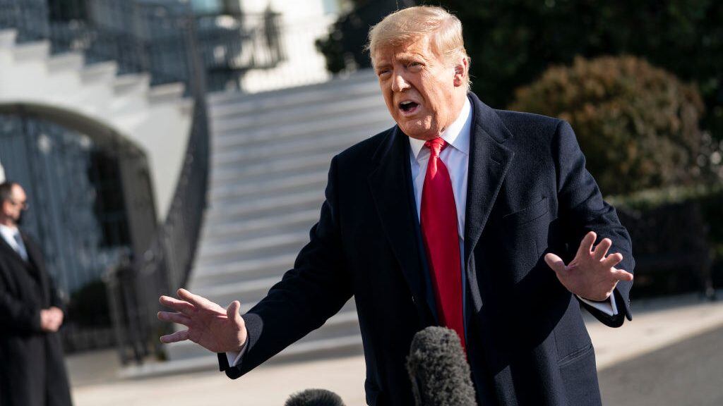 WASHINGTON, DC - JANUARY 12: U.S. President Donald Trump speaks to reporters on the South Lawn of the White House before boarding Marine One on January 12, 2021 in Washington, DC. Following last week's deadly pro-Trump riot at the U.S. Capitol, President Trump is making his first public appearance with a trip to the town of Alamo, Texas to view the partial construction of the wall along the U.S.-Mexico border. (Photo by Drew Angerer/Getty Images)
