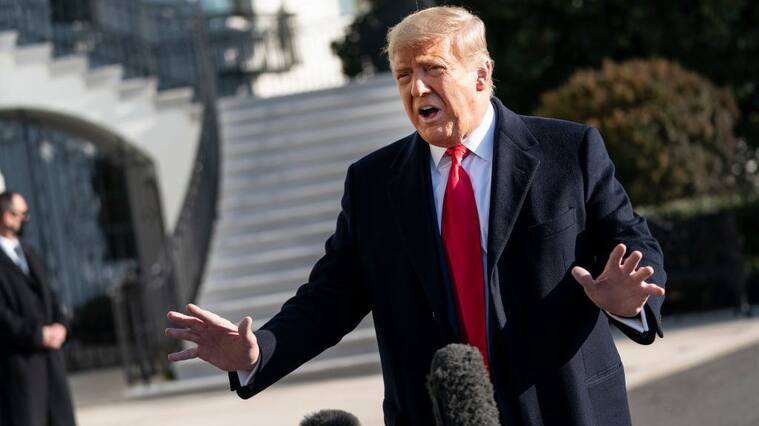 WASHINGTON, DC - JANUARY 12: U.S. President Donald Trump speaks to reporters on the South Lawn of the White House before boarding Marine One on January 12, 2021 in Washington, DC. Following last week's deadly pro-Trump riot at the U.S. Capitol, President Trump is making his first public appearance with a trip to the town of Alamo, Texas to view the partial construction of the wall along the U.S.-Mexico border. (Photo by Drew Angerer/Getty Images)