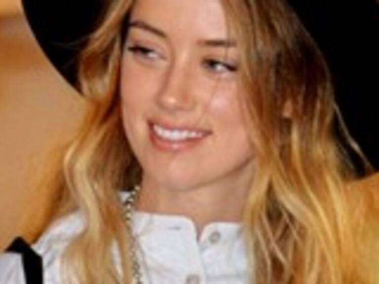 Amber Heard dedicó su amor a Johnny Depp con tatuaje de poema de Pablo Neruda