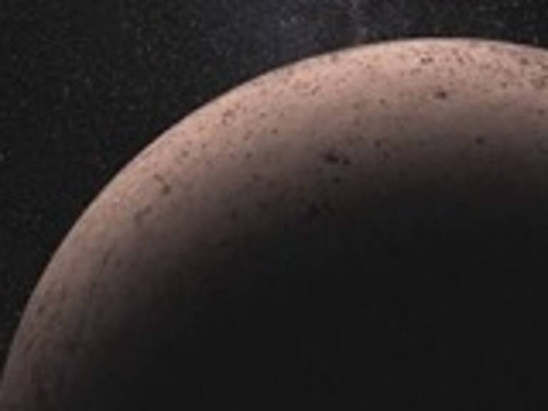 Descubren luna en planeta enano en los confines del sistema solar