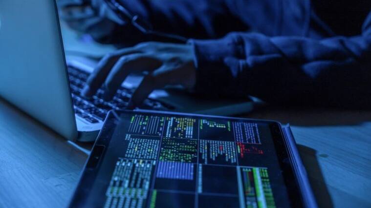 Payments System Hacking. Online Credit Cards Payment Security Concept. Hacker in Black Gloves Hacking the System.