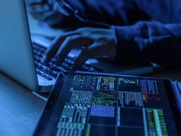 Payments System Hacking. Online Credit Cards Payment Security Concept. Hacker in Black Gloves Hacking the System.