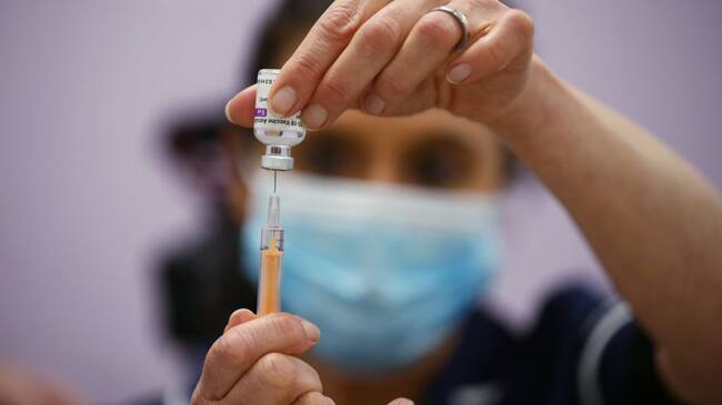 Suzie Shakespeare, Senior Immunisation Nurse, prepares a dose of Oxford/Astra Zeneca Covid-19 vaccine, during a mass vaccination of members of the public at Robertson House, Stevenage. Picture date: Tuesday February 9, 2021. (Photo by Yui Mok/PA Images via Getty Images)