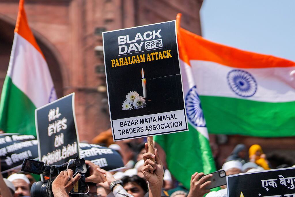 NEW DELHI, INDIA - APRIL 25: Indian Muslim people hold placards during a protest against the deadly attack on tourists in Pahalgam, Kashmir, in New Delhi, India, on April 25, 2025. At least 26 people were killed April 22 in Kashmir when gunmen opened fire on tourists. (Photo by Amarjeet Kumar Singh/Anadolu via Getty Images)