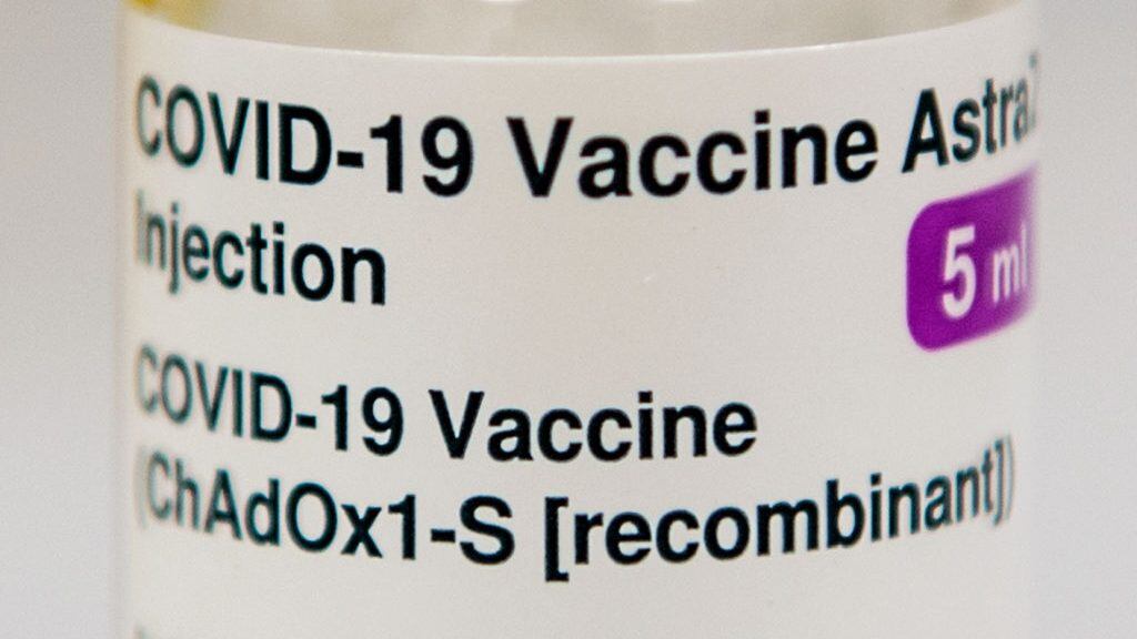 A vial of the AstraZeneca/Oxford Covid-19 vaccine is pictured at the Lochee Health Centre in Dundee on January 4, 2021. - Britain on Monday began rolling out the AstraZeneca/Oxford coronavirus vaccine, a possible game-changer in fighting the disease worldwide, while China raced to inoculate millions with a domestically made jab. (Photo by Andy Buchanan / POOL / AFP) (Photo by ANDY BUCHANAN/POOL/AFP via Getty Images)