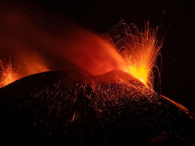 CATANIA, ITALY - FEBRUARY 15, 2021: Mount Etna erupts in Sicily sending plumes of ash and spewing lava into air- PHOTOGRAPH BY Marco Restivo / Barcroft Studios / Future Publishing (Photo credit should read Marco Restivo/Barcroft Media via Getty Images)
