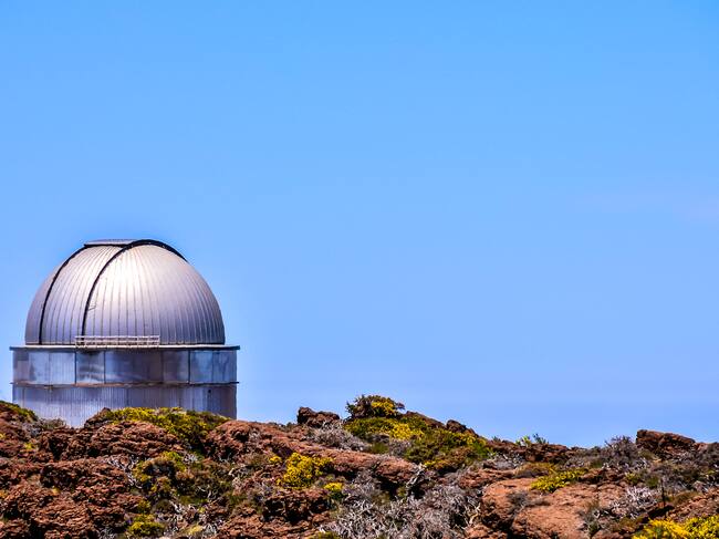 Photo Picture of a Modern Scientific Astronomical Observatory Telescope.