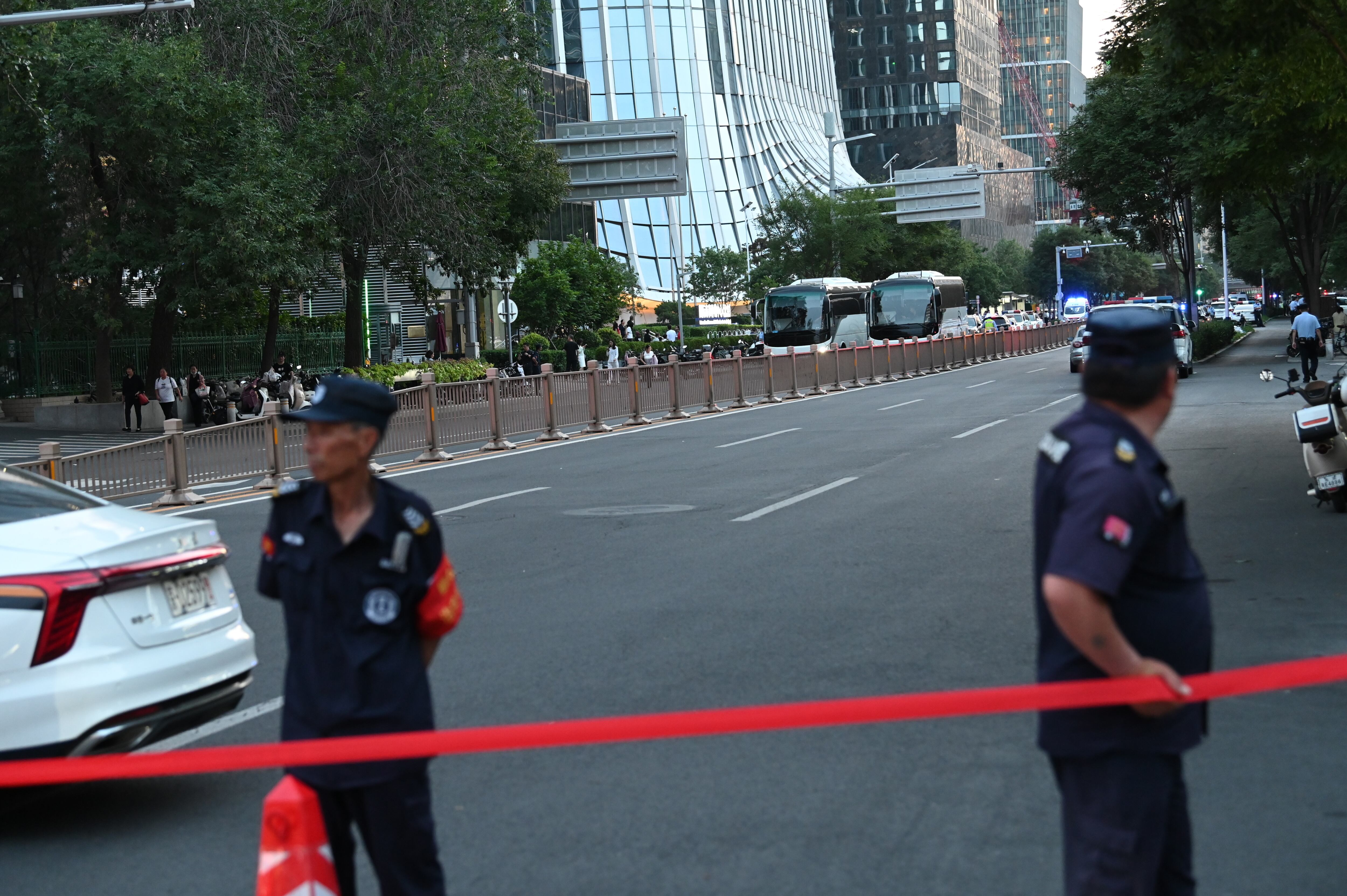 26 June 2026, China, Peking: Police have cordoned off the street near Citic Tower, also known as Zun Tower. In China's capital, Beijing, a small plane appears to have crashed into the city's tallest building. Photo: Johannes Neudecker/dpa (Photo by Johannes Neudecker/picture alliance via Getty Images)