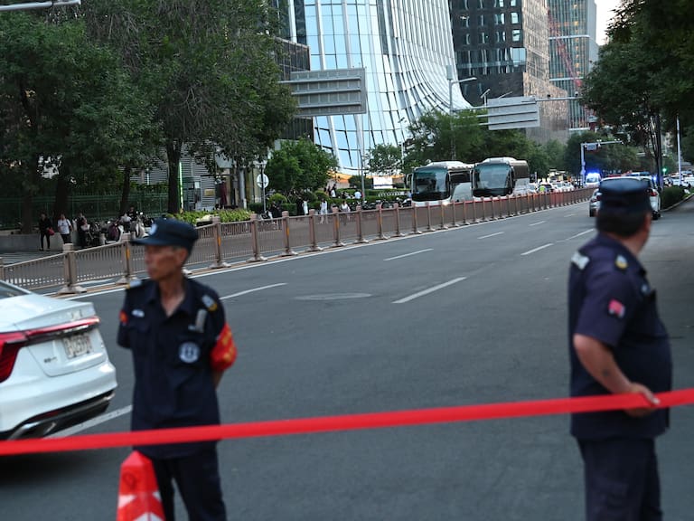 26 June 2026, China, Peking: Police have cordoned off the street near Citic Tower, also known as Zun Tower. In China's capital, Beijing, a small plane appears to have crashed into the city's tallest building. Photo: Johannes Neudecker/dpa (Photo by Johannes Neudecker/picture alliance via Getty Images)