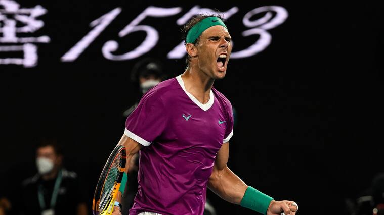 MELBOURNE, AUSTRALIA - JANUARY 30: Rafael Nadal of Spain celebrates against Daniil Medvedev of Russia in the final of the men’s singles during day 14 of the 2022 Australian Open at Melbourne Park on January 30, 2022 in Melbourne, Australia. (Photo by TPN/Getty Images)