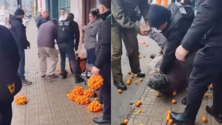 Ambulante provoca lluvia de mandarinas tras violenta intervención de inspectores municipales en Curicó: ojo al video