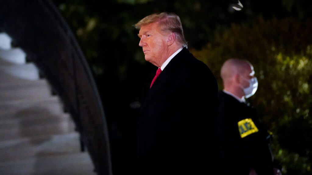 WASHINGTON, DC - JANUARY 12: U.S. President Donald Trump walks to the White House residence after exiting Marine One upon his return on January 12, 2021 in Washington, DC. Following last week's deadly pro-Trump riot on Capitol Hill, Trump traveled to the border town of Alamo, Texas to view the partial construction of wall along the U.S.-Mexico border. (Photo by Drew Angerer/Getty Images)