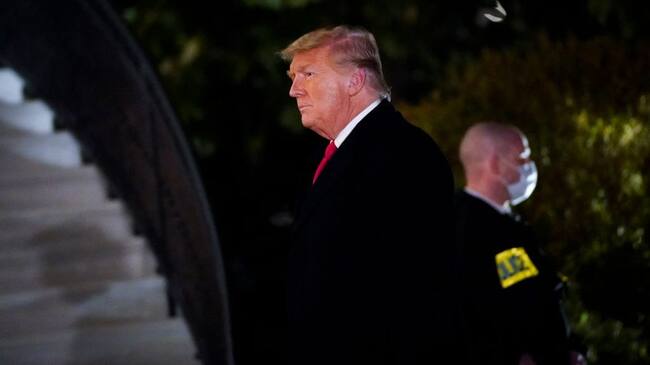 WASHINGTON, DC - JANUARY 12: U.S. President Donald Trump walks to the White House residence after exiting Marine One upon his return on January 12, 2021 in Washington, DC. Following last week's deadly pro-Trump riot on Capitol Hill, Trump traveled to the border town of Alamo, Texas to view the partial construction of wall along the U.S.-Mexico border. (Photo by Drew Angerer/Getty Images)