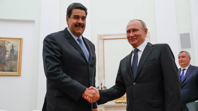 MOSCOW, RUSSIA - OCTOBER 4, 2017: Venezuela's President Nicolas Maduro shakes hands with his Russia counterpart Vladimir Putin (L-R) during a meeting at the Moscow Kremlin. Mikhail Metzel/TASS (Photo by Mikhail MetzelTASS via Getty Images)
