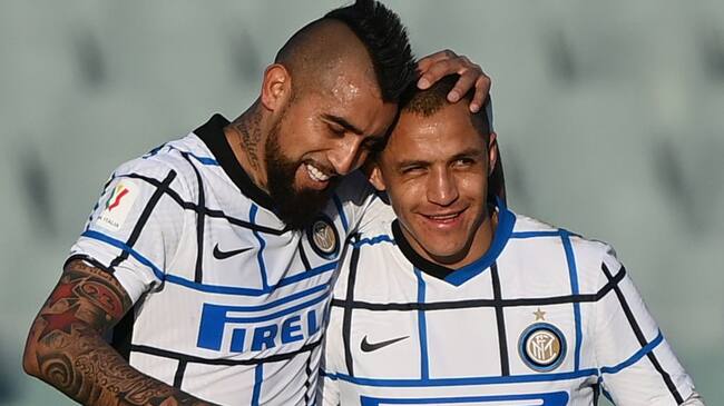 Inter Milan's Chilean midfielder Arturo Vidal (L) celebrates with Inter Milan's Chilean forward Alexis Sanchez after opening the scoring during the Italian Cup (Coppa Italia) round of sixteen football match Fiorentina vs Inter Milan on January 13, 2021 at the Artemio-Franchi stadium in Florence. (Photo by Vincenzo PINTO / AFP) (Photo by VINCENZO PINTO/AFP via Getty Images)