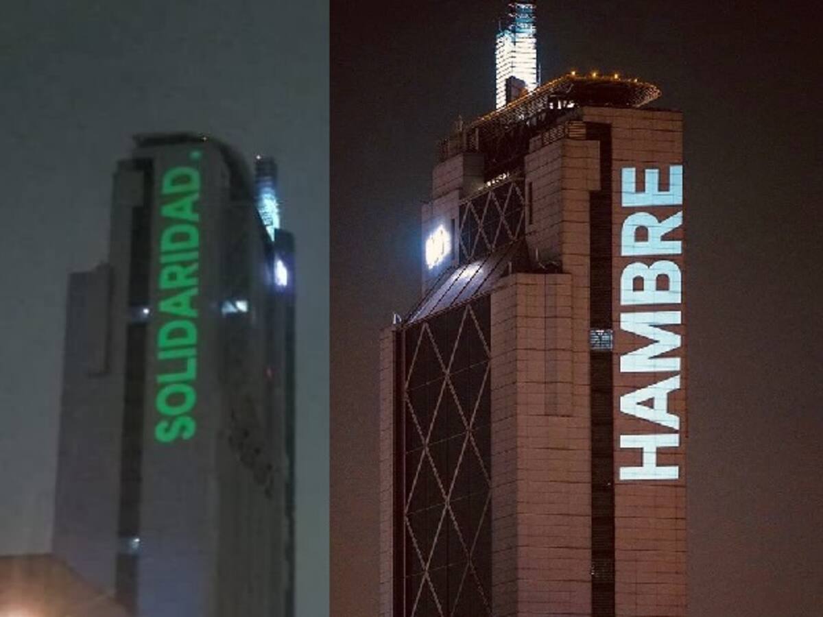 Responden al «hambre»: Proyectan mensaje de «solidaridad» en Torre Telefónica