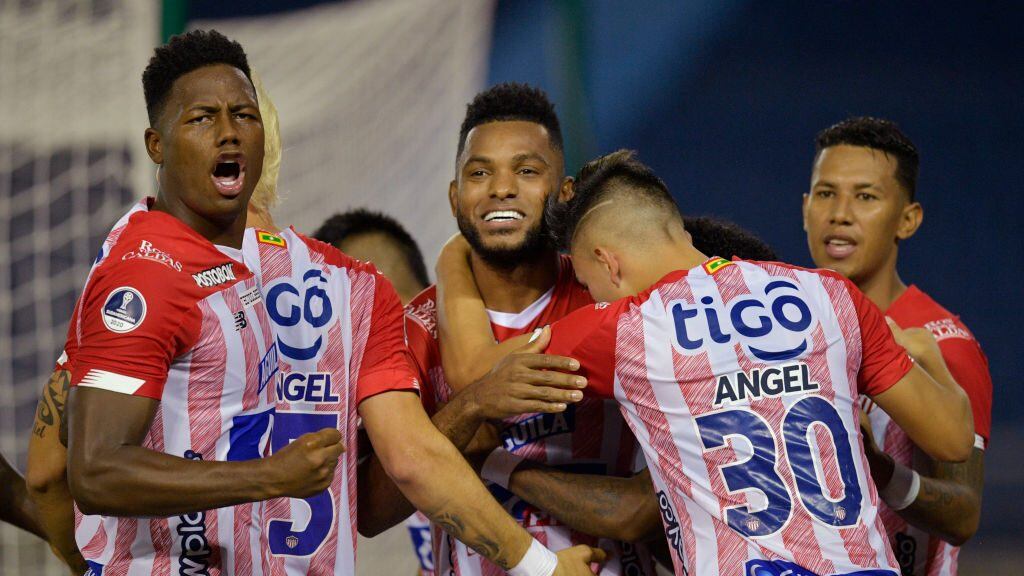 Colombia's Junior Miguel Angel Borja (C) celebrates with teammates after scoring a penalty kick against Chile's Coquimbo during their Copa Sudamericana quarterfinal football match at the Roberto Melendez stadium in Barranquilla, Colombia, on December 9, 2020. (Photo by Raul ARBOLEDA / AFP) (Photo by RAUL ARBOLEDA/AFP via Getty Images)