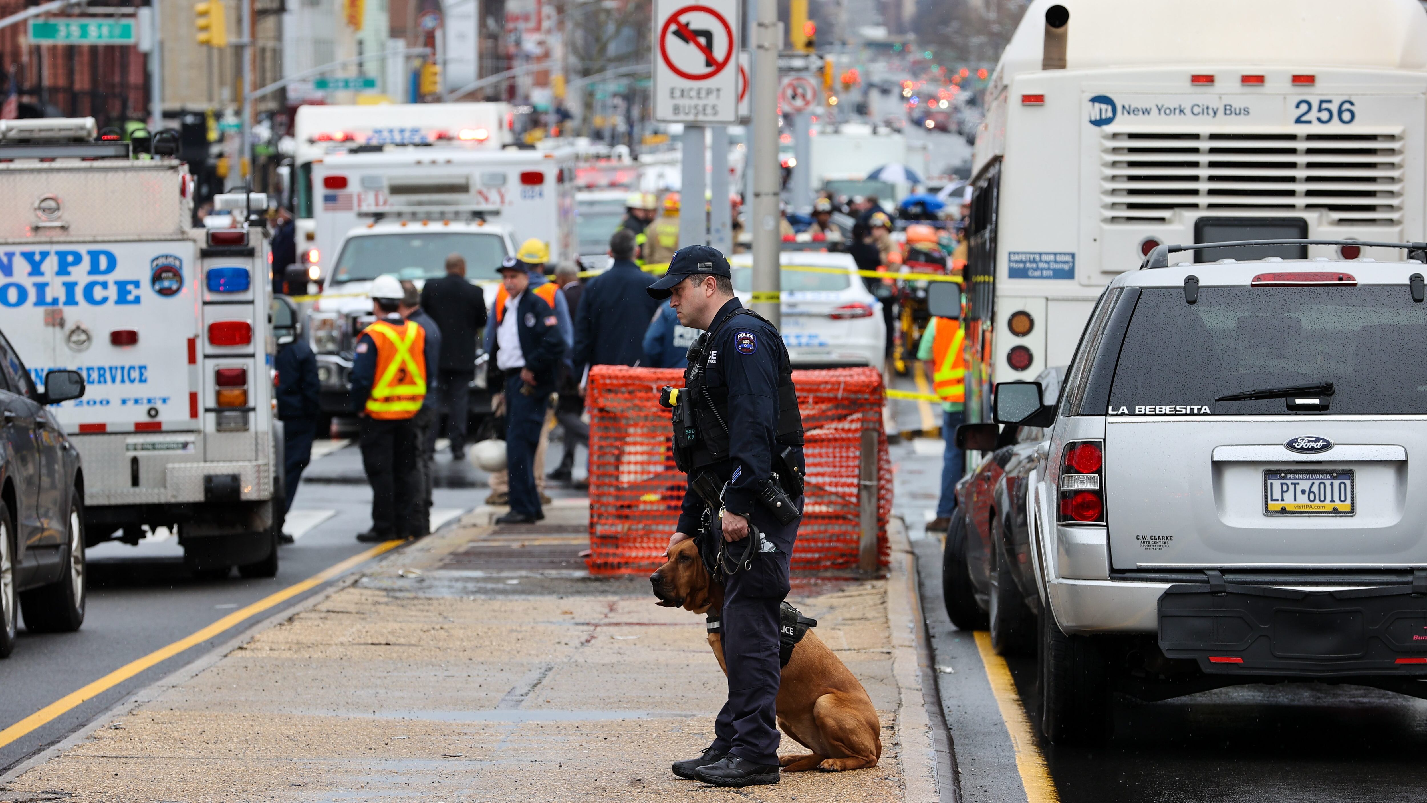 NEW YORK, USA - APRIL 12: Security measures are taken by New York City Police Department around the scene after multiple people were shot and undetonated devices were found at a subway station in New York City, United States on April 12, 2022. Authorities said an investigation is underway and told residents to avoid the area of 36th Street and 4th Avenue in Brooklyn. (Photo by Tayfun Coskun/Anadolu Agency via Getty Images)