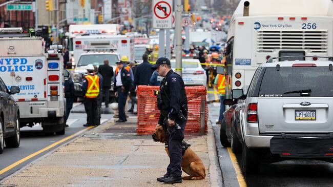 NEW YORK, USA - APRIL 12: Security measures are taken by New York City Police Department around the scene after multiple people were shot and undetonated devices were found at a subway station in New York City, United States on April 12, 2022. Authorities said an investigation is underway and told residents to avoid the area of 36th Street and 4th Avenue in Brooklyn. (Photo by Tayfun Coskun/Anadolu Agency via Getty Images)