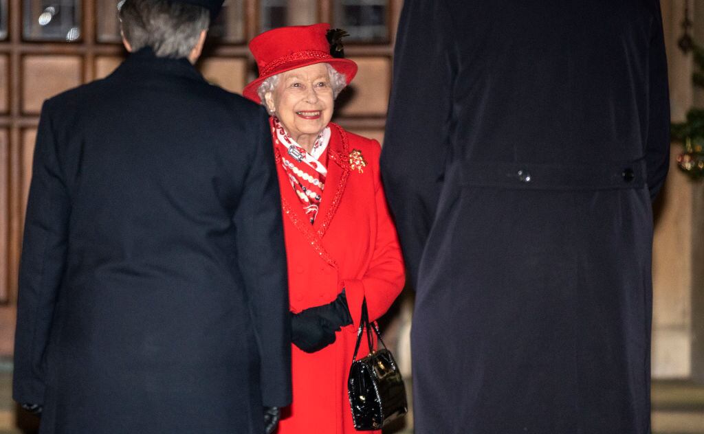WINDSOR, ENGLAND - DECEMBER 08: Queen Elizabeth II thanks volunteers and key workers at Windsor Castle on December 08, 2020 in Windsor, England. The Queen and members of the royal family gave thanks to local volunteers and key workers for their work in helping others during the coronavirus pandemic and over Christmas at Windsor Castle in what was also the final stop for the Duke and Duchess of Cambridge on their tour of England, Wales and Scotland. (Photo by Richard Pohle - WPA Pool/Getty Images)