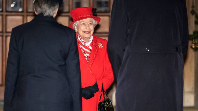 WINDSOR, ENGLAND - DECEMBER 08: Queen Elizabeth II thanks volunteers and key workers at Windsor Castle on December 08, 2020 in Windsor, England. The Queen and members of the royal family gave thanks to local volunteers and key workers for their work in helping others during the coronavirus pandemic and over Christmas at Windsor Castle in what was also the final stop for the Duke and Duchess of Cambridge on their tour of England, Wales and Scotland. (Photo by Richard Pohle - WPA Pool/Getty Images)