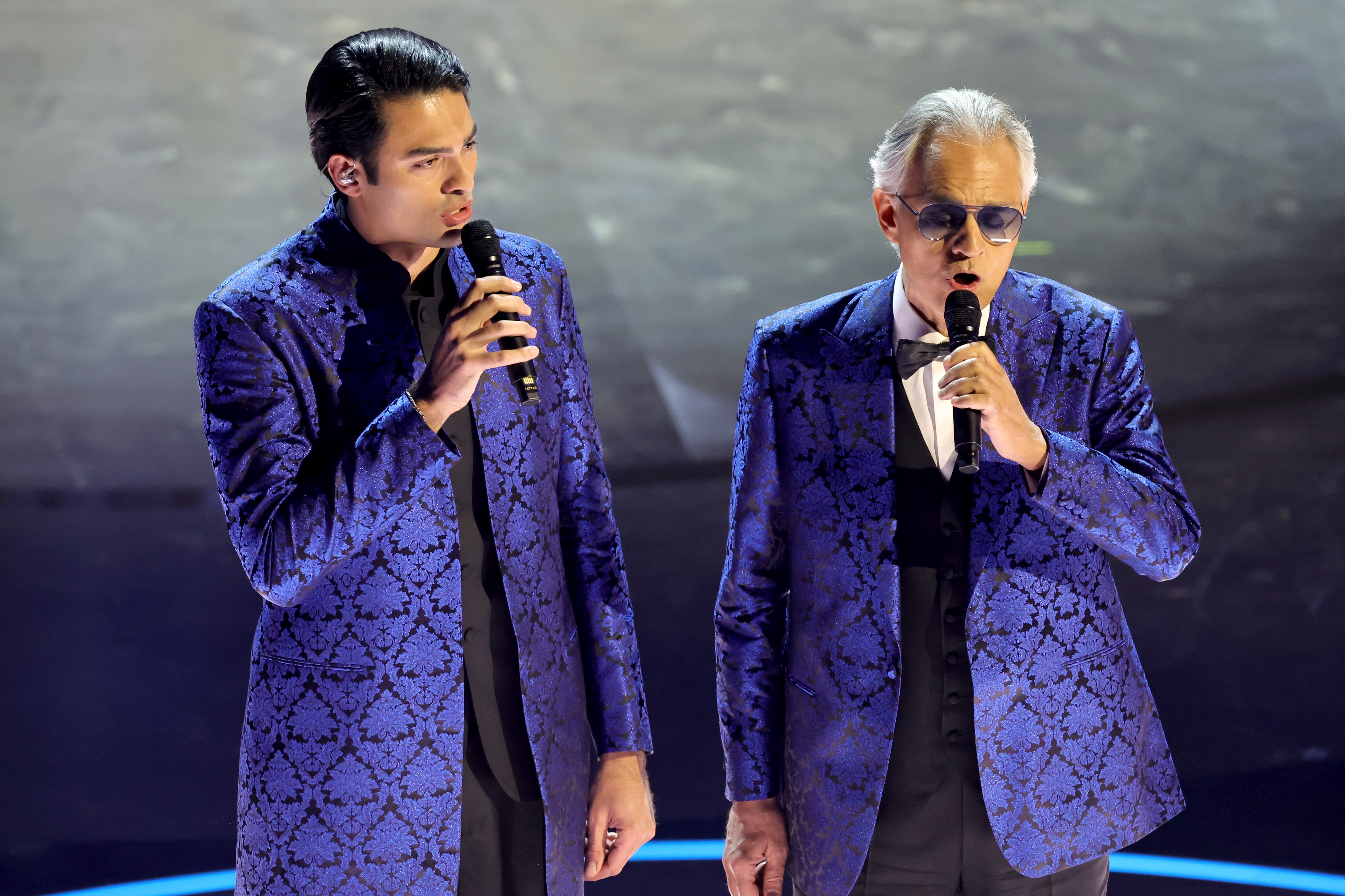 HOLLYWOOD, CALIFORNIA - MARCH 10: (L-R) Matteo Bocelli and Andrea Bocelli onstage during the 96th Annual Academy Awards at Dolby Theatre on March 10, 2024 in Hollywood, California. (Photo by Kevin Winter/Getty Images)