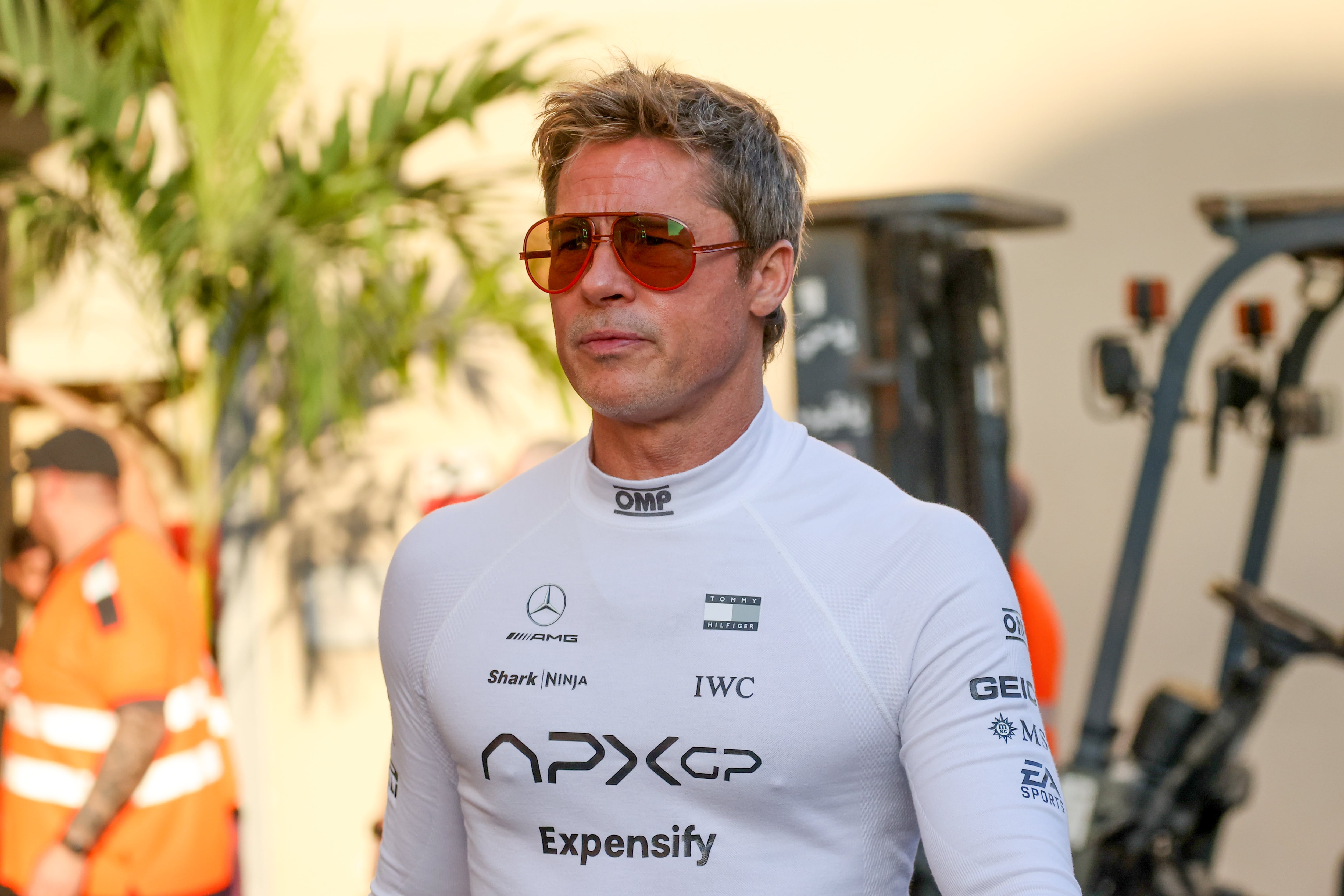 Brad Pitt, brad pittactor playing Sonny Hayes, a driver of the fictional Apex APXGP F1 team in the upcoming 'F1' movie directed by Joseph Kosinski, is seen in a paddock ahead of Formula 1 Abu Dhabi Grand Prix at Yas Marina Circuit on December 5th, 2024 in Abu Dhabi, United Arab Emirates. (Photo by Beata Zawrzel/NurPhoto via Getty Images)