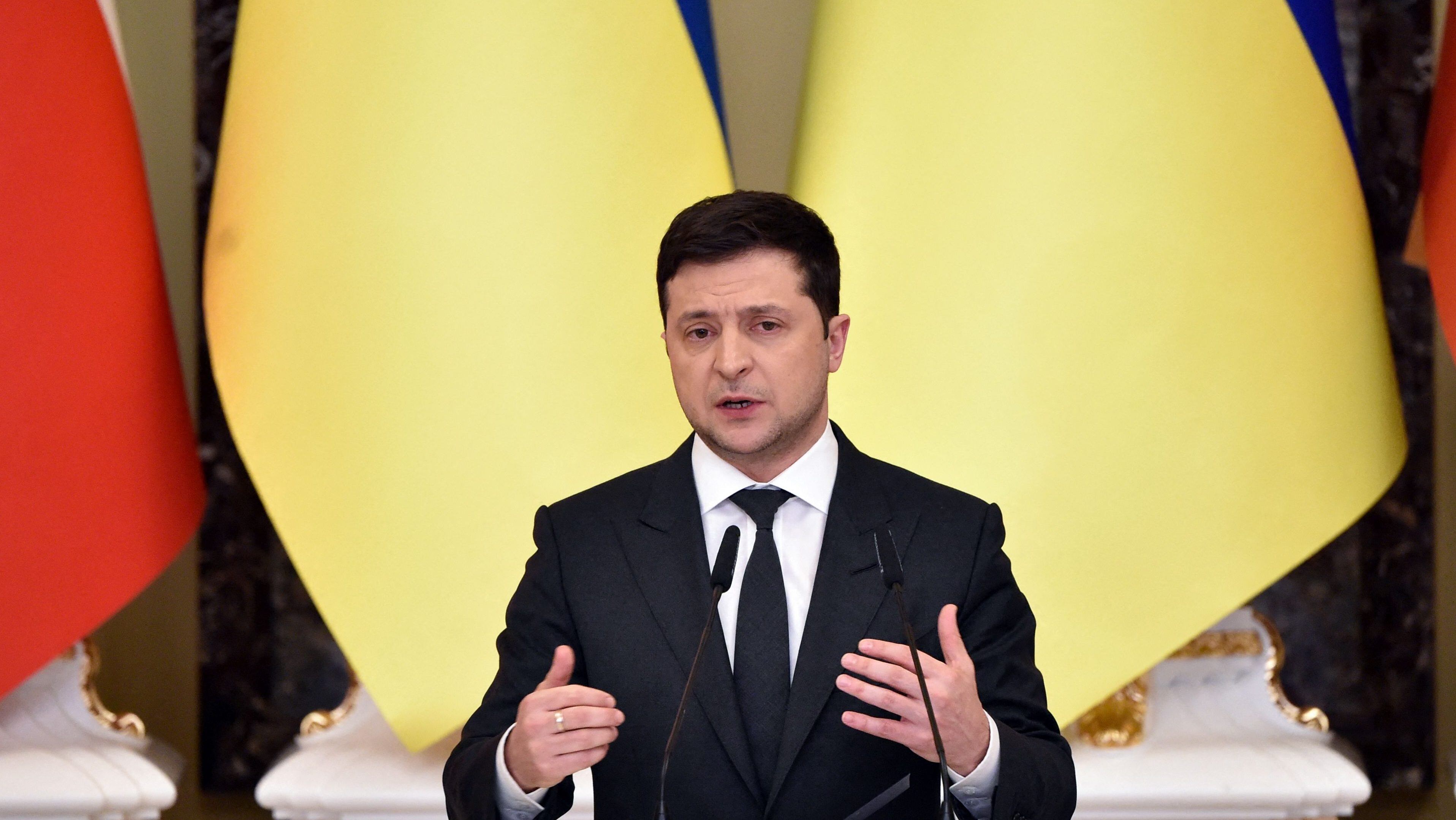 Ukrainian President Volodymyr Zelensky attends a joint press conference with his counterparts from Lithuania and Poland following their talks in Kyiv on February 23, 2022. (Photo by SERGEI SUPINSKY / AFP) (Photo by SERGEI SUPINSKY/AFP via Getty Images)