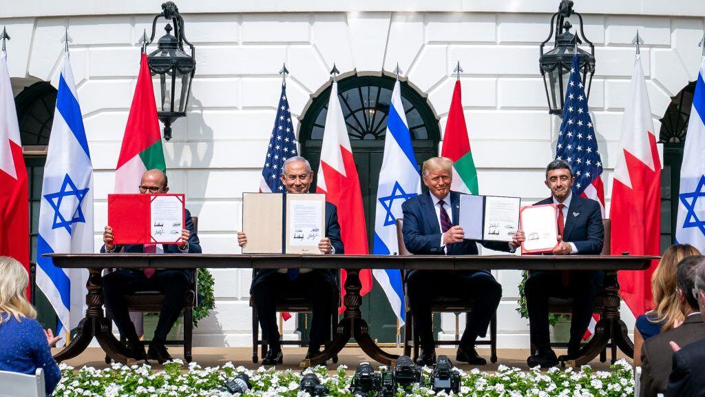 WASHINGTON, USA - SEPTEMBER 15: (----EDITORIAL USE ONLY â MANDATORY CREDIT - "THE WHITE HOUSE / TIA DUFOUR / HANDOUT" - NO MARKETING NO ADVERTISING CAMPAIGNS - DISTRIBUTED AS A SERVICE TO CLIENTS----) U.S. President Donald Trump (2nd R), Israeli Prime Minister Benjamin Netanyahu (2nd L), UAE Foreign Minister Abdullah bin Zayed Al Nahyan (R) and Bahrain Foreign Minister Abdullatif bin Rashid Al Zayani (L) attend a signing ceremony for the agreements on "normalization of relations" reached between Israel, the United Arab Emirates (UAE) and Bahrain at the White House in Washington, United States on September 15, 2020. (Photo by The White House / Tia Dufour / Handout/Anadolu Agency via Getty Images)