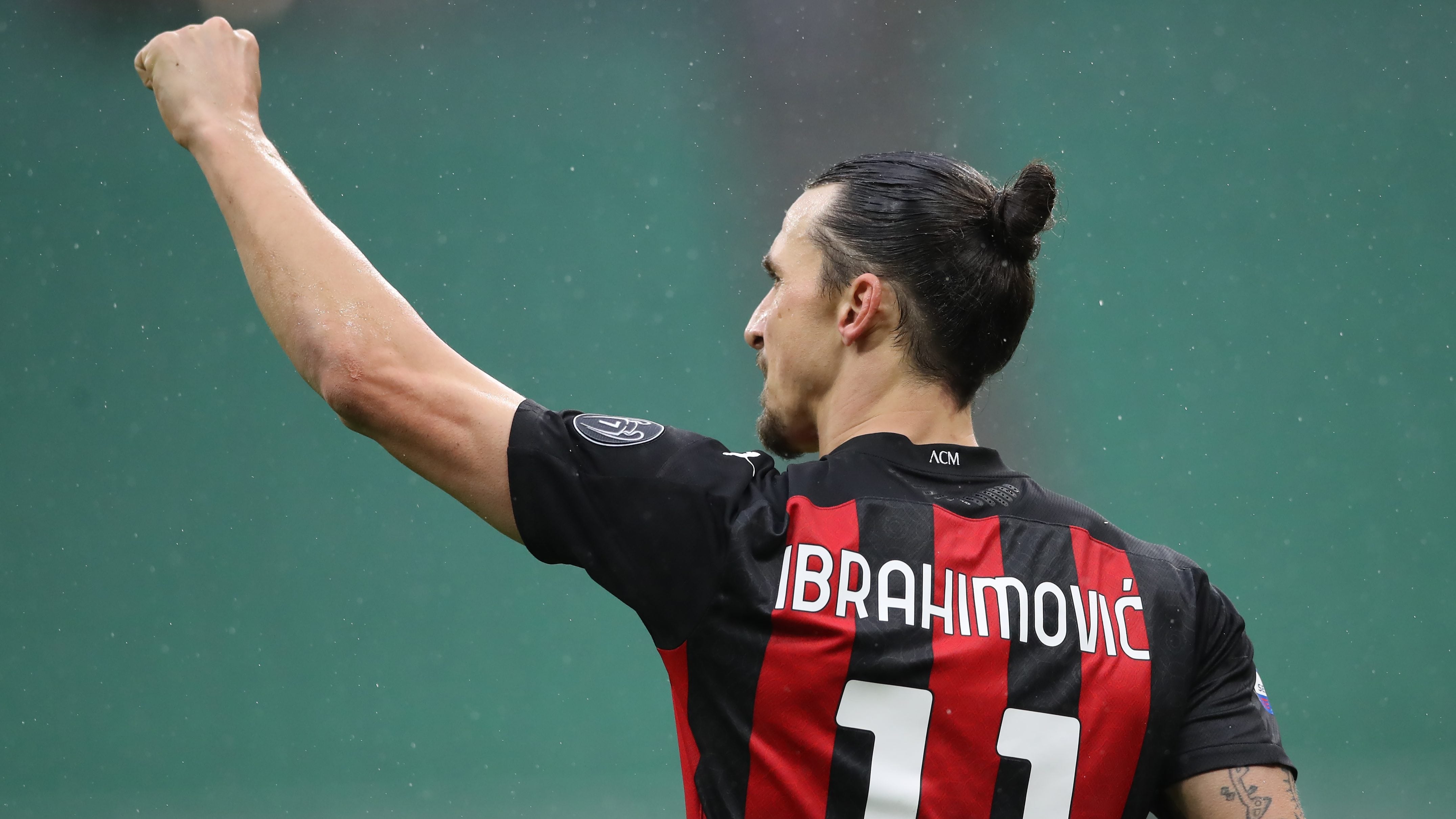MILAN, ITALY - FEBRUARY 07: Zlatan Ibrahimovic of AC Milan celebrates after scoring to give the side a 1-0 lead during the Serie A match between AC Milan and FC Crotone at Stadio Giuseppe Meazza on February 07, 2021 in Milan, Italy. Sporting stadiums around Italy remain under strict restrictions due to the Coronavirus Pandemic as Government social distancing laws prohibit fans inside venues resulting in games being played behind closed doors. (Photo by Jonathan Moscrop/Getty Images)