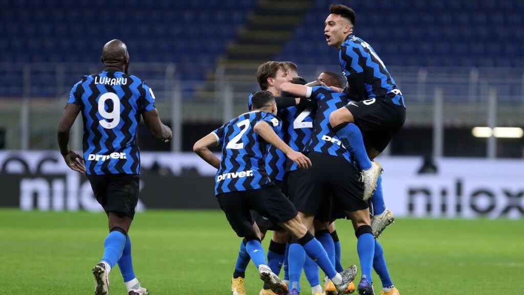 MILAN, ITALY - JANUARY 26: (BILD ZEITUNG OUT) Christian Eriksen of FC Internazionale celebrates after scoring his team's second goal with team mates during the Coppa Italia match between FC Internazionale and AC Milan at Stadio Giuseppe Meazza on January 26, 2021 in Milan, Italy. Sporting stadiums around Italy remain under strict restrictions due to the Coronavirus Pandemic as Government social distancing laws prohibit fans inside venues resulting in games being played behind closed doors. (Photo by Sportinfoto/DeFodi Images via Getty Images)