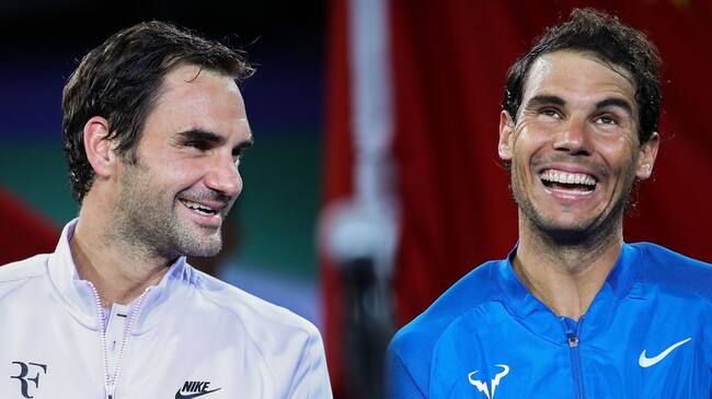 SHANGHAI, CHINA - OCTOBER 15: Roger Federer of Switzerland talk with Rafael Nadal of Spain during the award ceremony after the Men's singles final mach on day eight of 2017 ATP Shanghai Rolex Masters at Qizhong Stadium on October 15, 2017 in Shanghai, China. (Photo by Lintao Zhang/Getty Images)