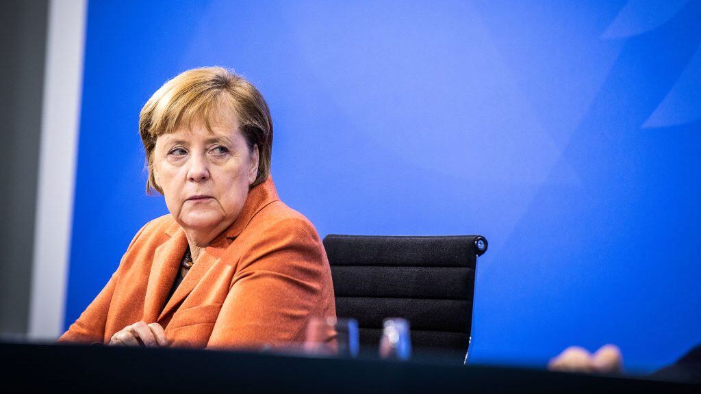 BERLIN, GERMANY - DECEMBER 13: German Chancellor Angela Merkel speaks to the media about new, stricter lockdown measures following a meeting of federal and states government leaders on December 13, 2020 in Berlin, Germany. Germany has seen record numbers of daily new infections and deaths in recent days despite a semi-lockdown that has been in place since November 1. (Photo by Rainer Keuenhof-Pool/Getty Images)