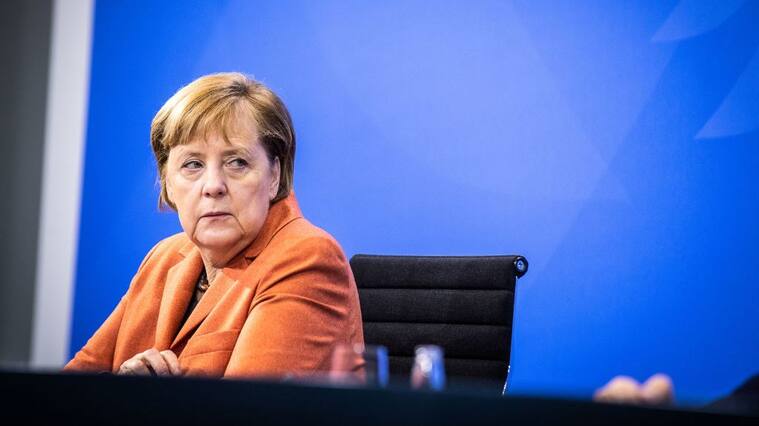 BERLIN, GERMANY - DECEMBER 13: German Chancellor Angela Merkel speaks to the media about new, stricter lockdown measures following a meeting of federal and states government leaders on December 13, 2020 in Berlin, Germany. Germany has seen record numbers of daily new infections and deaths in recent days despite a semi-lockdown that has been in place since November 1. (Photo by Rainer Keuenhof-Pool/Getty Images)
