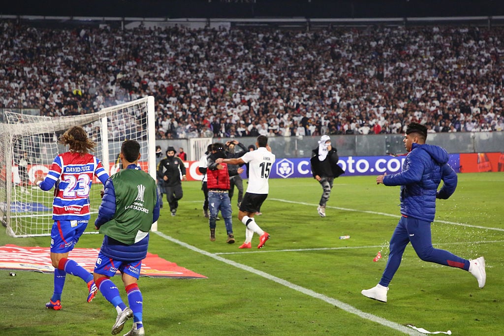 SANTIAGO, CHILE - APRIL 10: Players of Fortaleza scape the pitch during the CONMEBOL Copa Libertadores group E match between Colo Colo and Fortaleza at Estadio Monumental David Arellano on April 10, 2025 in Santiago, Chile. (Photo by Marcelo Hernandez/Getty Images)