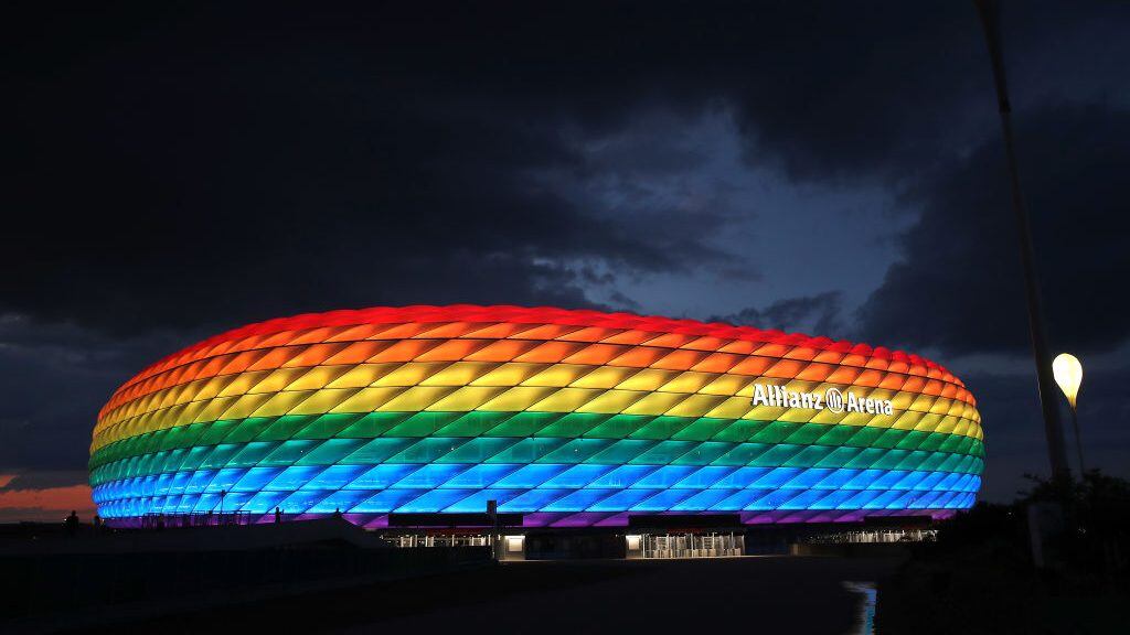 MUNICH, GERMANY - JULY 11: A general view outside of the soccer stadium Allianz Arena which is illuminated in rainbow colours for Christopher Street Day (CSD) on July 11, 2020 in Munich, Germany. Christopher Street Day is an annual European LGBT celebration and demonstration held in various cities across Europe for the rights of LGBT people and against discrimination and exclusion. (Photo by Alexander Hassenstein/Getty Images)