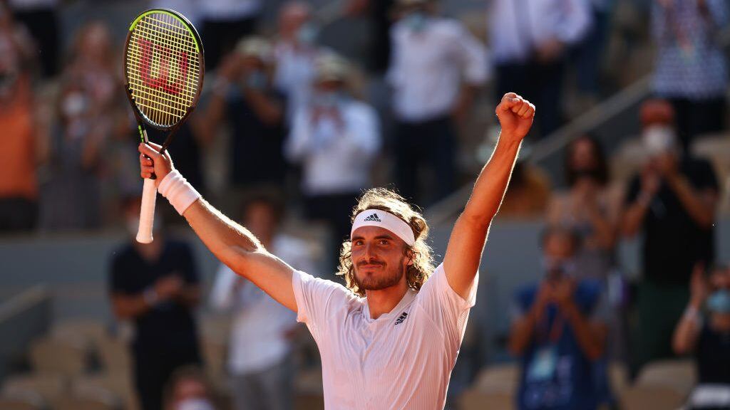 PARIS, FRANCE - JUNE 11: Stefanos Tsitsipas of Greece celebrates after winning match point during his Men's Singles Semi Final match against Alexander Zverev of Germany on day Thirteen of the 2021 French Open at Roland Garros on June 11, 2021 in Paris, France. (Photo by Julian Finney/Getty Images)