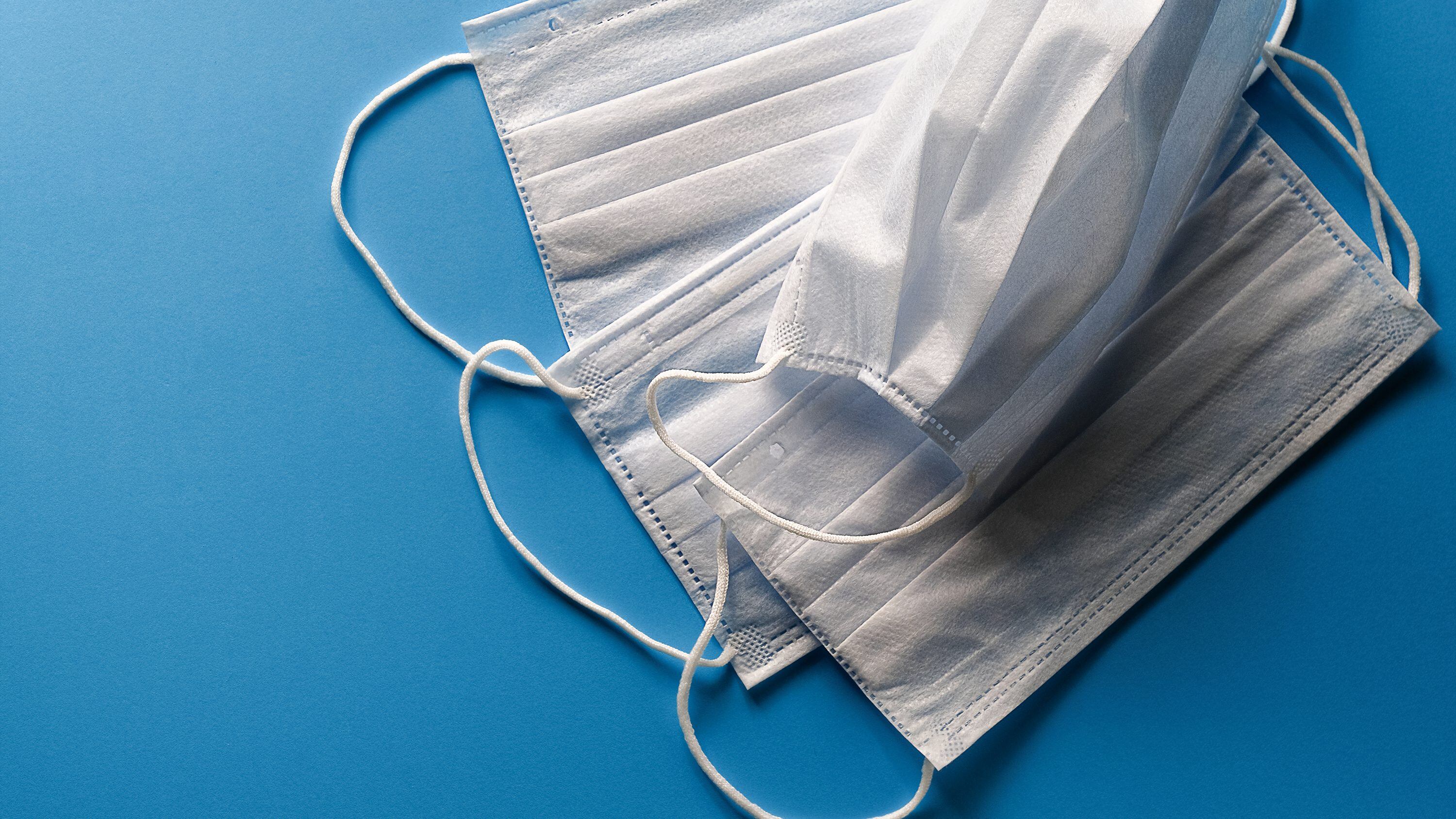 Medical Disposable Protective Face Masks. Concept Of Air Pollution, Outbreaks Of Pneumonia And Viruses, Epidemics Of Coronaviruses And Prevention Of The Risk Of Biological Pollution.