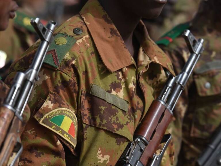 Malian troops stand guard prior to the visit of the French Prime Minister at the Operation Barkane military French base in Gao, Mali, on February 24, 2019. (Photo by ALAIN JOCARD / AFP) (Photo credit should read ALAIN JOCARD/AFP via Getty Images)