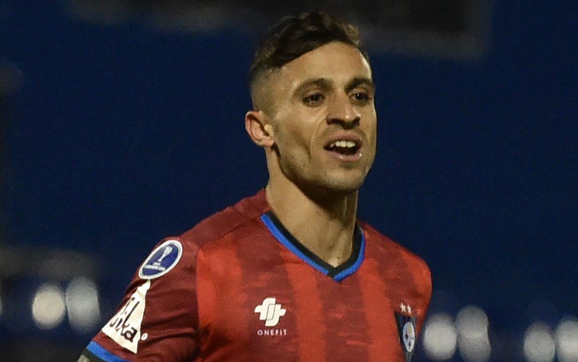 Chile's Huachipato Argentine Walter Mazzantti celebrates after scoring against Paraguay's 12 de Octubre during the Copa Sudamericana football tournament group stage match at the Luis Alfonso Giagni stadium in Villa Elisa, Paraguay, on May 12, 2021. (Photo by NORBERTO DUARTE / AFP) (Photo by NORBERTO DUARTE/AFP via Getty Images)