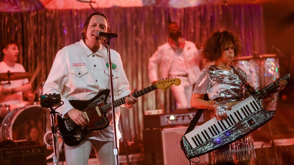 NEW ORLEANS, LOUISIANA - FEBRUARY 14: Win Butler (L) and Regine Chassagne of Arcade Fire perform at the third annual Krewe du Kanaval Ball at the Mahalia Jackson Theater on February 14, 2020 in New Orleans, Louisiana. (Photo by Josh Brasted/WireImage)
