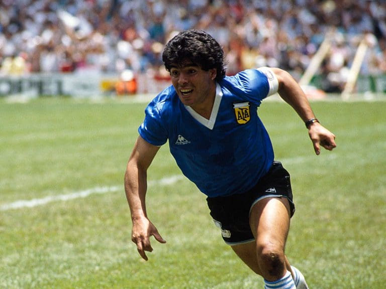 Diego Maradona from Argentina celebrates after scoring his second goal against England in a quarterfinal match of the 1986 FIFA World Cup.   (Photo by Jean-Yves Ruszniewski/Corbis/VCG via Getty Images)